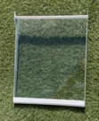 Refrigerator Glass Shelf Assembly Part # WR71X10902 From Model GNS23GMHBFES. Fixed Price $46.00.