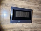 WB56X44652 Ge Microwave Door Assembly WB56X38147. Fixed Price $90.00.