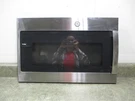 Ge Microwave Door Chips/deep Scratches Part # WB56X30286. Fixed Price $175.00.