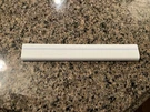 Genuine Refrigerator Freezer Upper Shelf Rail WR17X10710. Fixed Price $14.95.