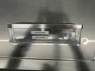 Profile Refrigerator Small Door Bin New- WR71X31847. Fixed Price $40.00.