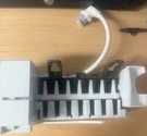 Ge Ice Maker 197D7636G001, WR30X10077, WR30X10093 Used With Bucket. Fixed Price $30.00.