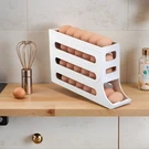 Automatic Rolling Egg Dispenser Organizer For Refrigerator 4-TIER Space-saving. Fixed Price $7.99.